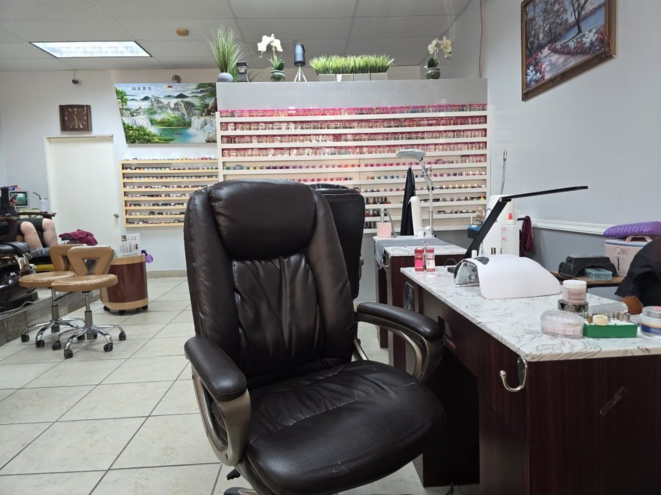Nail salon interior with manicure stations